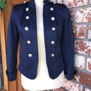 Navy blazer with large silver buttons